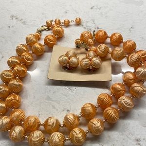 Plastic satin look double strand necklace and matching earrings